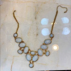 White/Gold faux pearl in a faux gold layer